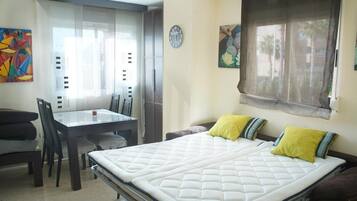 1 dormitorio, tabla de planchar con plancha, wifi gratis y ropa de cama