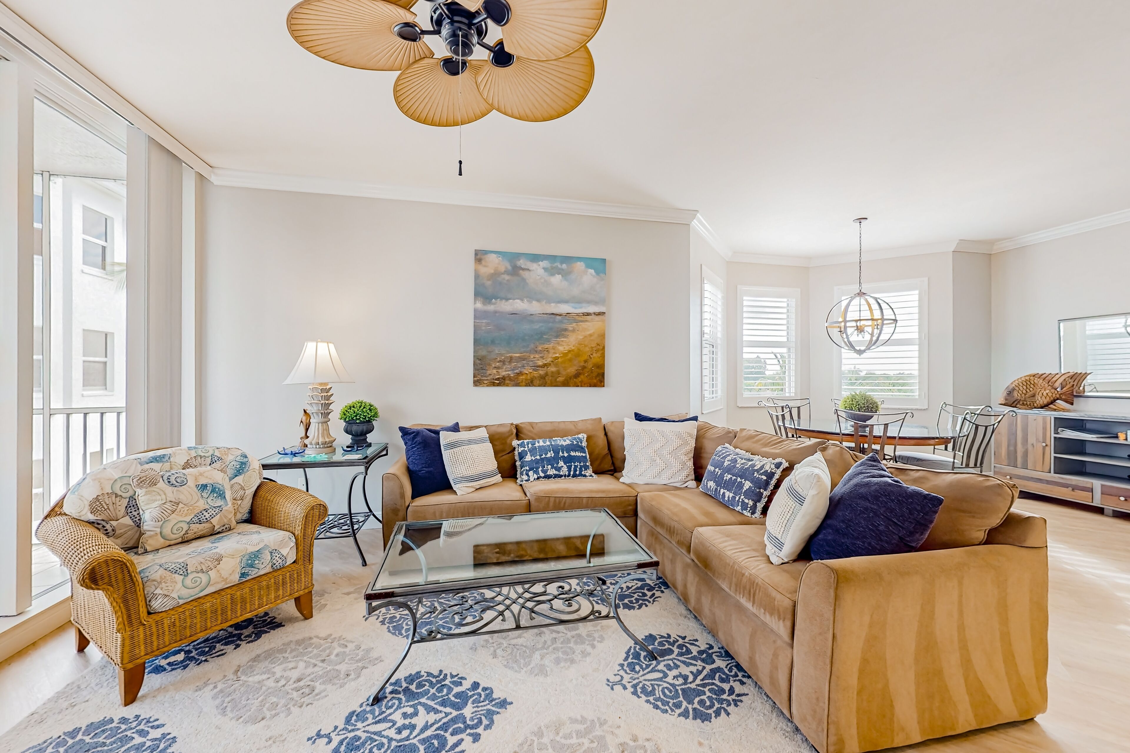 Bright water view condo with saltwater pool, hot tub, grill, gym, and balcony