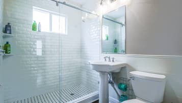 Shower, eco-friendly toiletries, hair dryer, towels