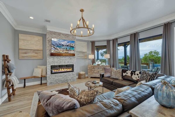 Smart TV, fireplace, books