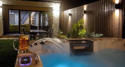 Duplex semi-detached home with private garden bar and hot tub
