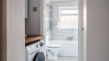 Hair dryer, towels, soap, shampoo