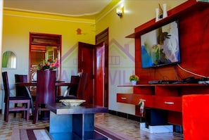 Superior Apartment, Balcony, Lake View | Living area | Netflix, DVD player, streaming services - Lwanar Villas and Apartments (Entebbe)