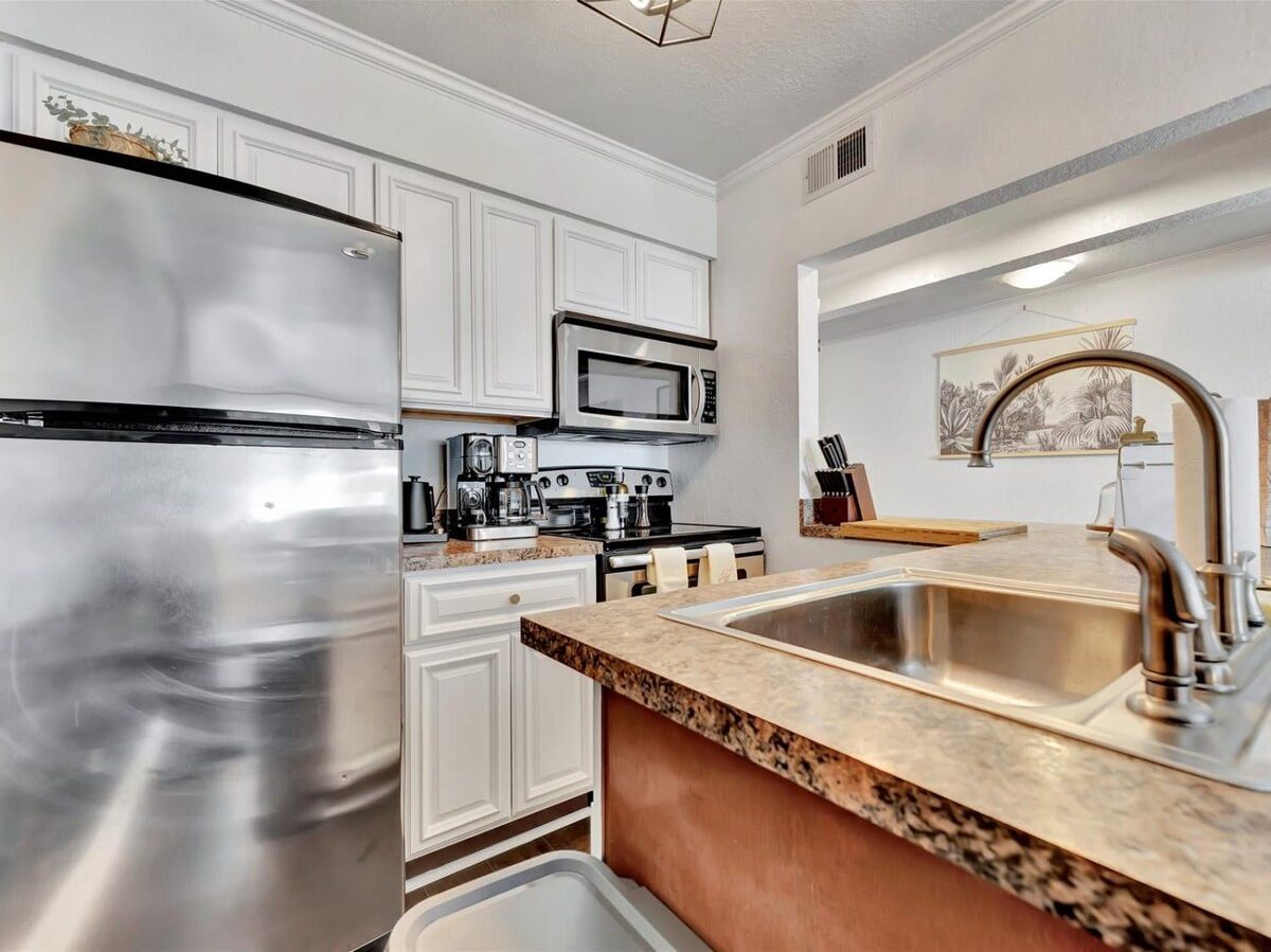 Your fully equipped kitchen awaits with stainless steel appliances, granite countertops, and everything you need to prepare delicious meals during your stay.