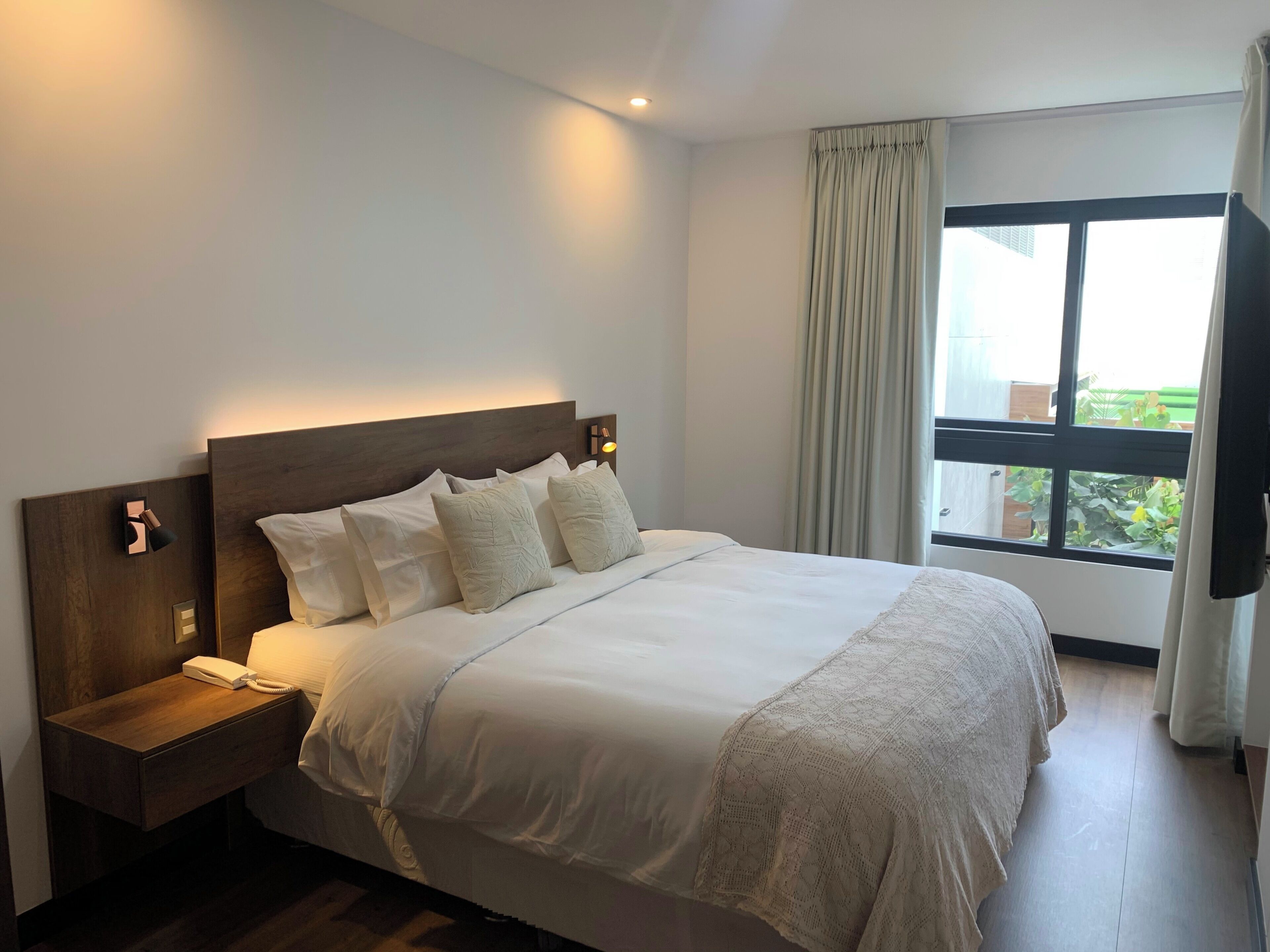Egyptian cotton sheets, premium bedding, down comforters, in-room safe