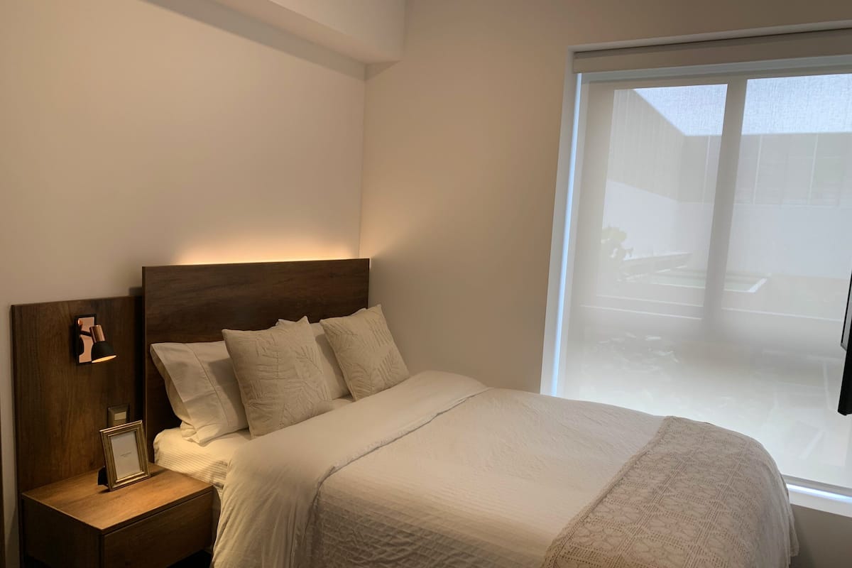 Appartement Exécutif, 2 chambres, vue cour intérieure | 2 chambres, draps en coton égyptien, literie de qualité supérieure