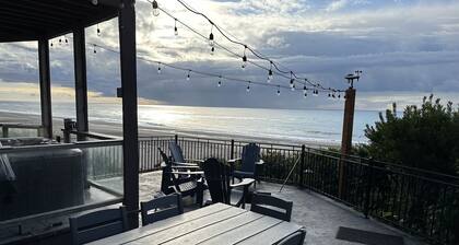 Luxury beachfront property with amazing views, hot tub and steps to the beach.