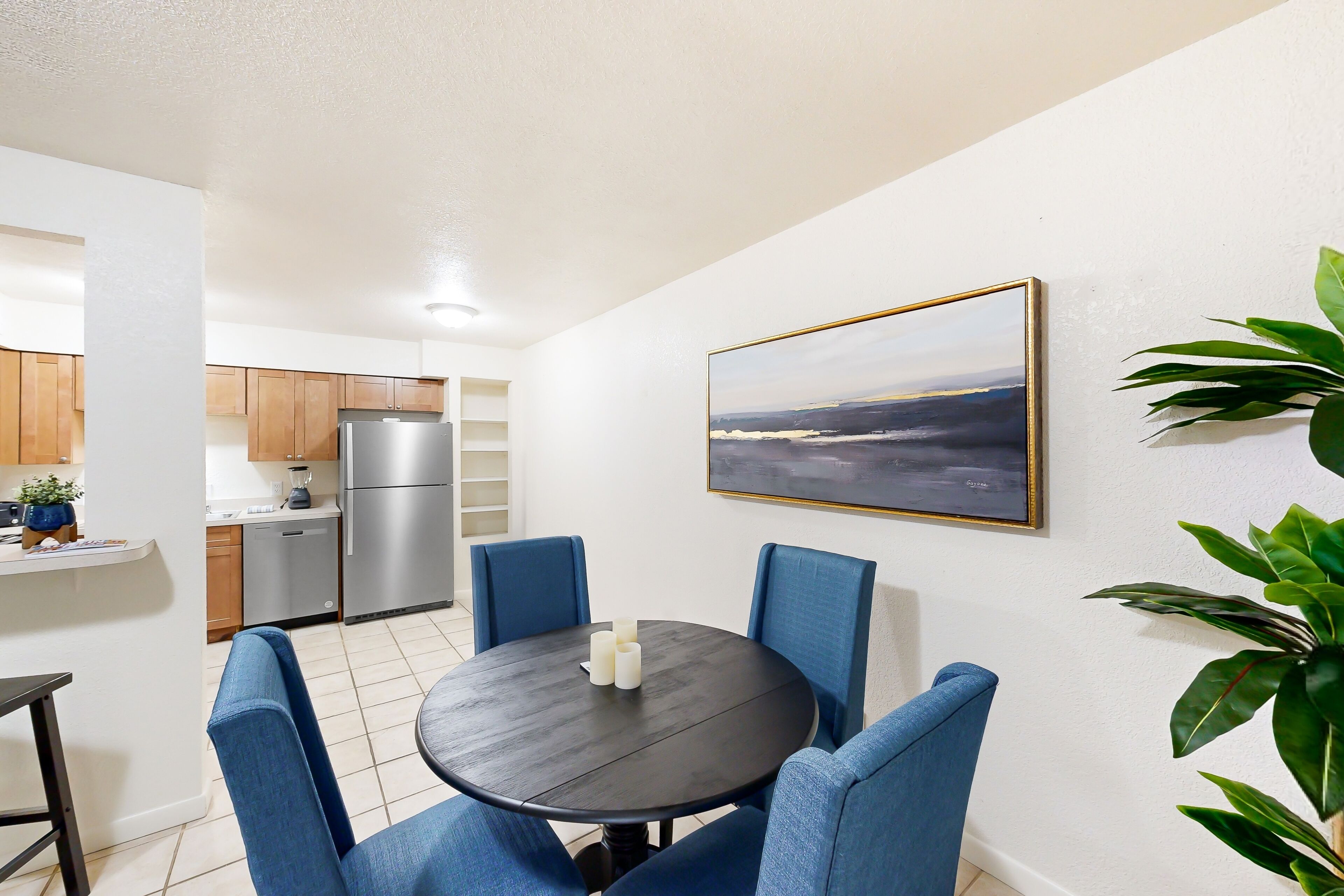 Updated dog-friendly duplex with sunroom, grill, central AC, streaming, and W/D
