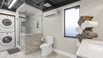 Shower, hair dryer, towels, soap