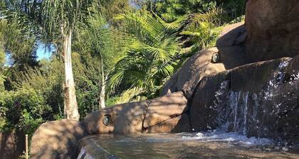 Spacious 6 Bedroom Vacation Home with Waterslide & Heated Saltwater Pool