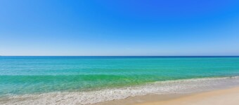 Steps to Shore: PCB Condo w/ Pool Access + Views!