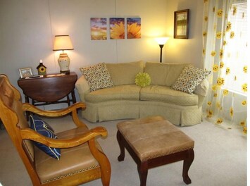 Home away from home waiting for you. Couch and "King" chair with ottoman.
 