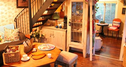 Gorgeous cozy cottage besides a bustling stream, surrounded by gorgeous greenery