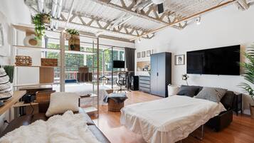 1 bedroom, desk, iron/ironing board, travel crib