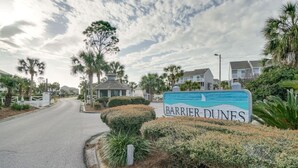 A residential street with a sign for Barrier Dunes. - Dog Heaven · Pet-Friendly Beach·Pools & Pickleball (Port St. Joe)