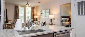 Walk to the square and the grove! This 2BR 2BA is the perfect location. 