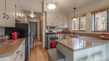 Full-sized fridge, microwave, oven, dishwasher