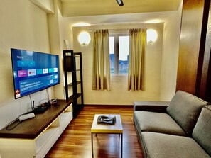 Family Apartment | Living area | Flat-screen TV