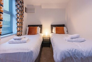2 slaapkamers, een strijkplank/strijkijzer, gratis wifi