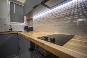 Microwave, coffee/tea maker, high chair, cookware/dishes/utensils - Compact Comfort: A Capsule Studio (Athens)