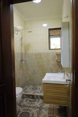 Shower, towels, soap, shampoo