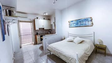 1 chambre, fer et planche Ă repasser, Wi-Fi, draps fournis