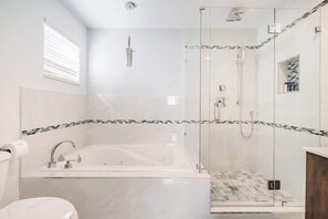 Shower, jetted tub, hair dryer, towels