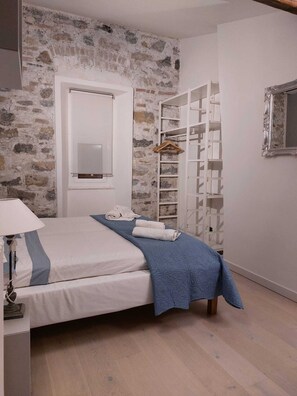 2 habitaciones, tabla de planchar con plancha, wifi y ropa de cama