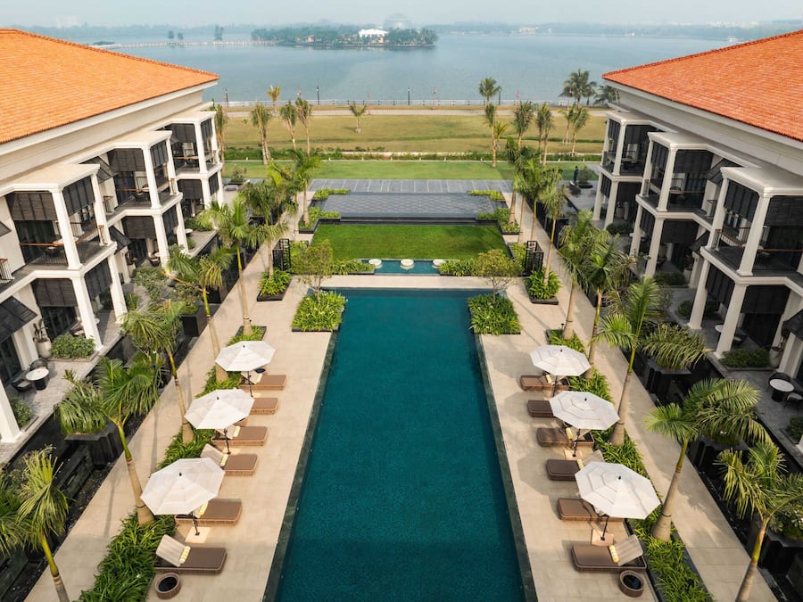 Outdoor pool, open 8:00 AM to 9:00 PM, pool umbrellas