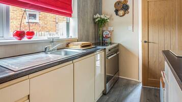 Dishwasher, high chair, cookware/dishes/utensils