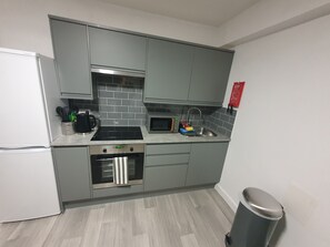 Private kitchen - One bedroom flat centrally located.  (Woburn Sands)