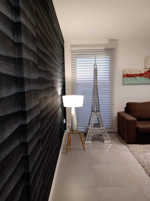 Executive Room | Living area | 42-inch Smart TV with digital channels - Be Haus Temporary Apartments (San Luis)