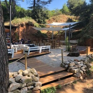 Relax in a serene outdoor setting with comfortable seating and scenic views.