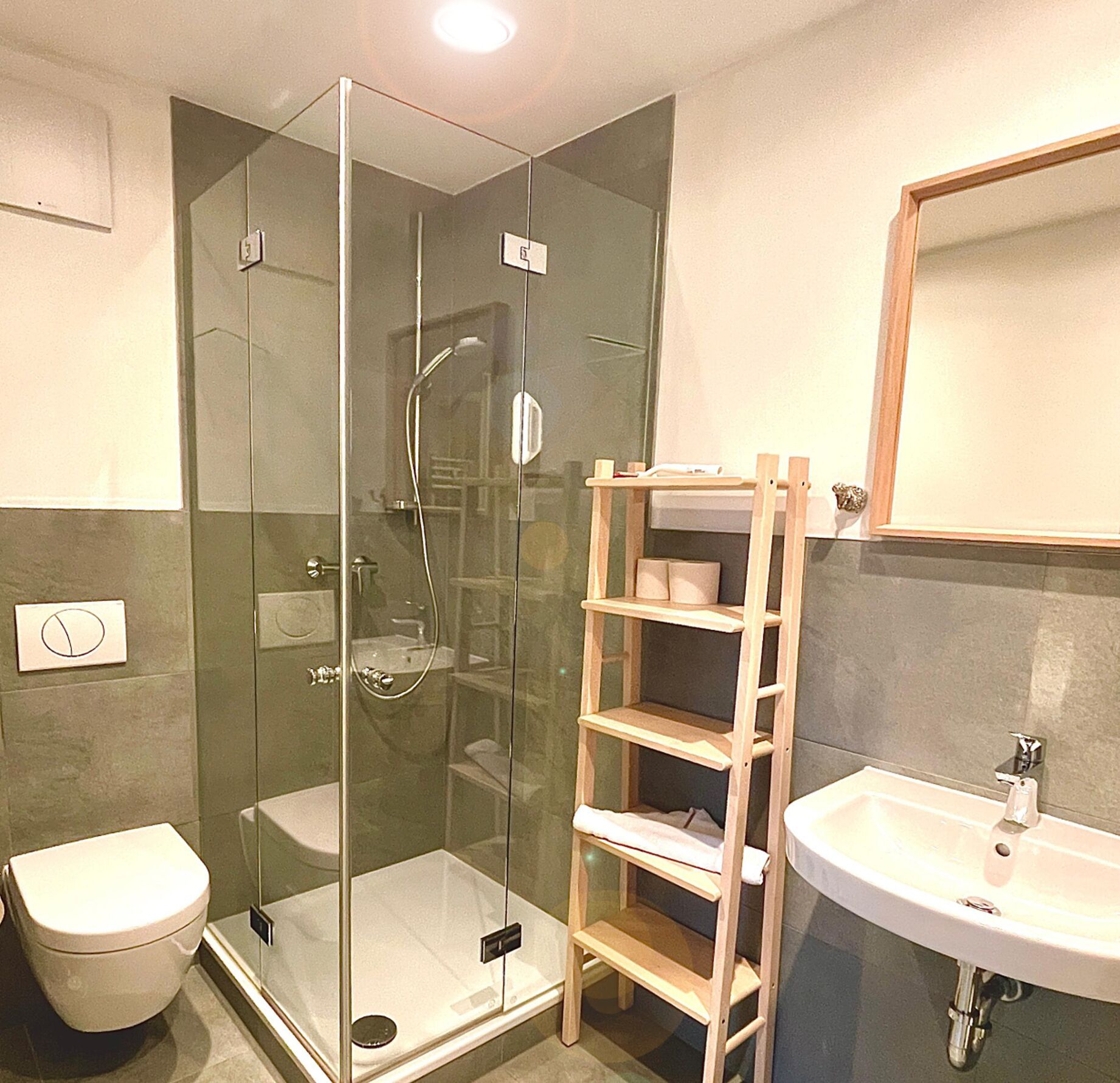 Shower, hair dryer, towels, shampoo