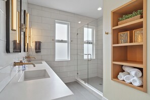 Shower, hair dryer, towels, soap
