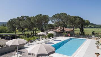 Seasonal outdoor pool, pool umbrellas, sun loungers