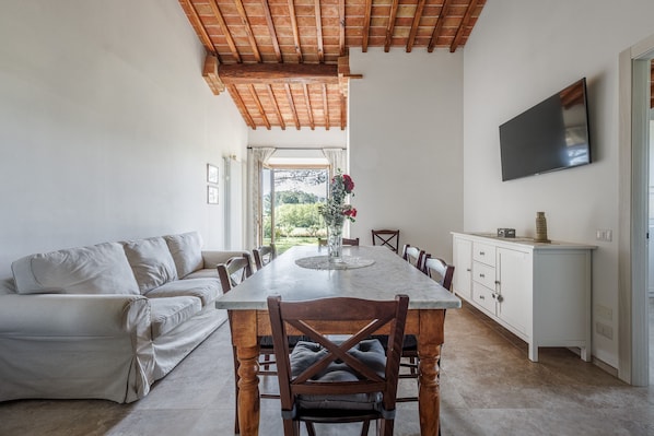 Villa | Living area | 32-inch flat-screen TV with cable channels