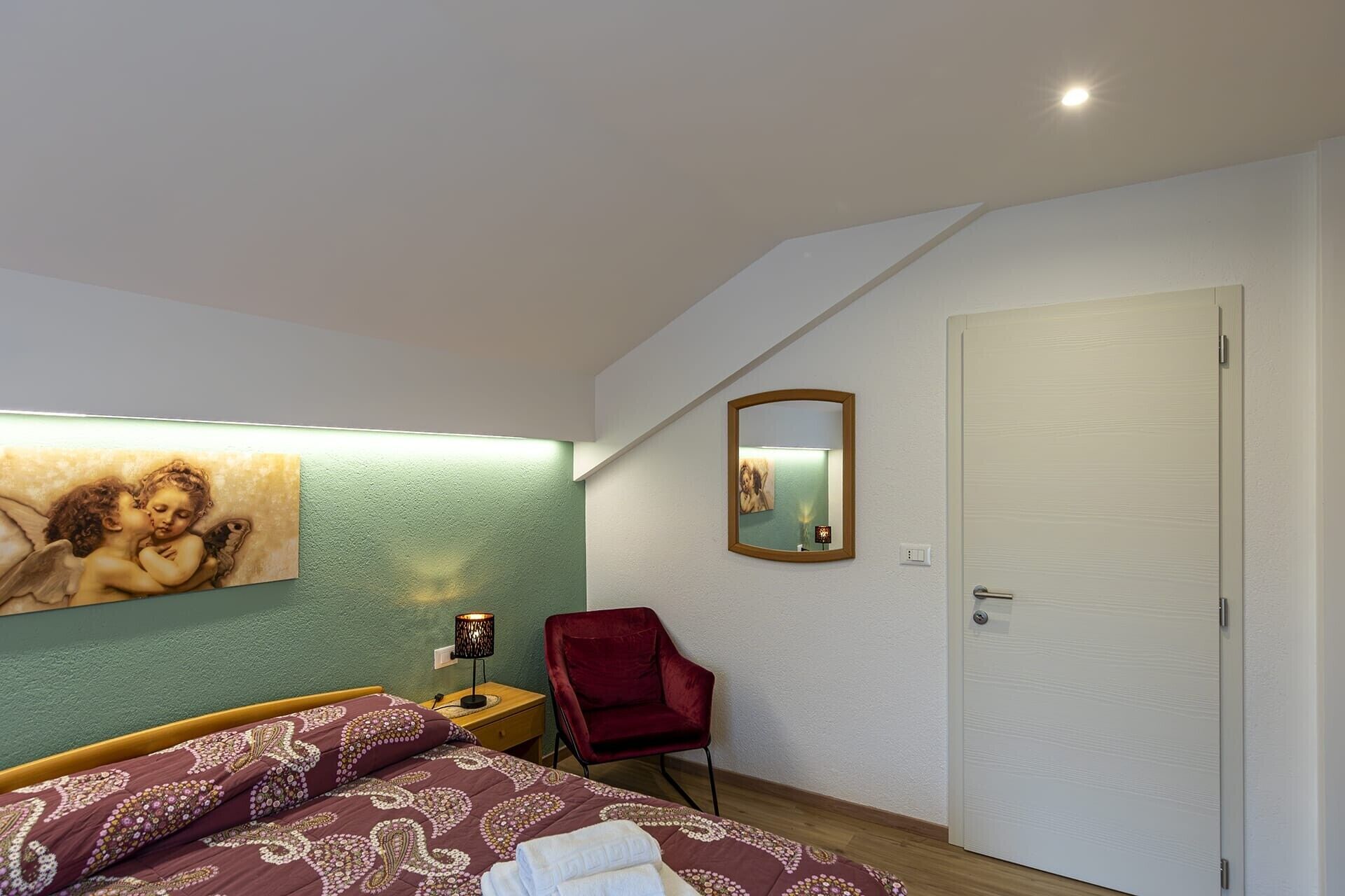2 slaapkamers, een strijkplank/strijkijzer, beddengoed