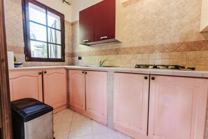 Fridge, microwave, stovetop, cookware/dishes/utensils