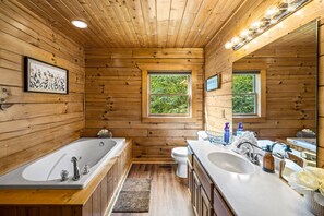 Jetted tub, hair dryer, towels, soap