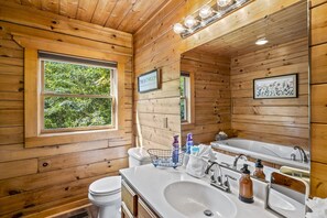 Jetted bath, hair dryer, towels, soap