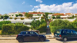 A residential area with houses, a staircase, and parked cars. - 1 bedroom lovely apartment in Split (Split)