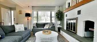 Cozy 4BR home, walk to track/downtown, private yard w/ patio