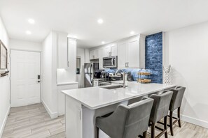 Fridge, microwave, oven, stovetop - Coastal Elegance in Wild Pines!  Pool, Tennis, Shopping, NEW Beach Park Fall '25 (Bonita Springs)