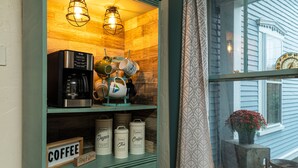 A kitchen with a coffee maker, mugs, and containers labeled 'Sugar' and 'Coffee'. - Historic 150-year-old farmhouse, Jacuzzi included (Chester)