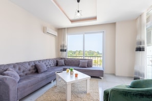 Apartemen Keluarga, 2 kamar tidur | Area keluarga | TV LCD