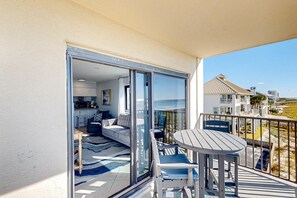 Outdoor dining - Gulf-front condo with Gulf-view balcony, on-site pool, & beach access (Navarre Beach)
