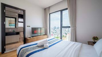 Deluxe Apartment, 2 Bedrooms, Balcony, City View | In-room safe, individually decorated, individually furnished, desk