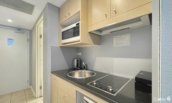 Fridge, microwave, cookware/dishes/utensils