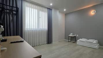 1 habitación, escritorio, cortinas blackout y sistema de insonorización
